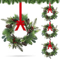 4 PCS 9" Small Christmas Norfolk Wreaths Mini Cabinet Wreaths for Kitchen with Red Berry Pinecone Cedar Bows Snowy Pine Wreath for Xmas Front Door Window Fireplace Home Table Pillar Stairs Decor by Unknown