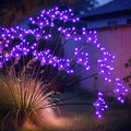 JJGoo Solar Garden Lights, New Upgraded 4 Pack Solar Swaying Starburst Light, Waterproof Fireworks Outdoor Lights, Yard Patio Pathway Decoration, Purple by JJGoo